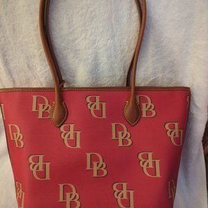 A red monogramed Dooney & Bourke tote